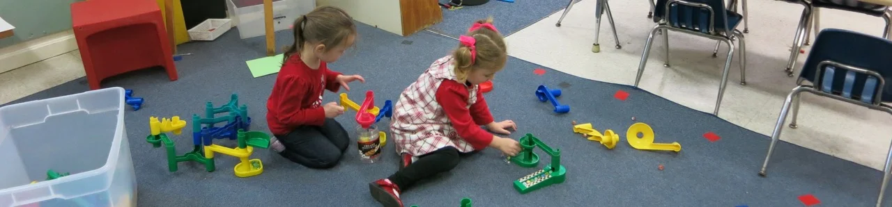 girls-at-play-w-structure-blocks-lg.jpg