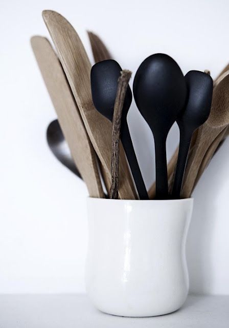 Purchase some simple items to give your space a new look. Keep the colour palatte nuetral and timeless. Match utensils and have them on display for easy access. 