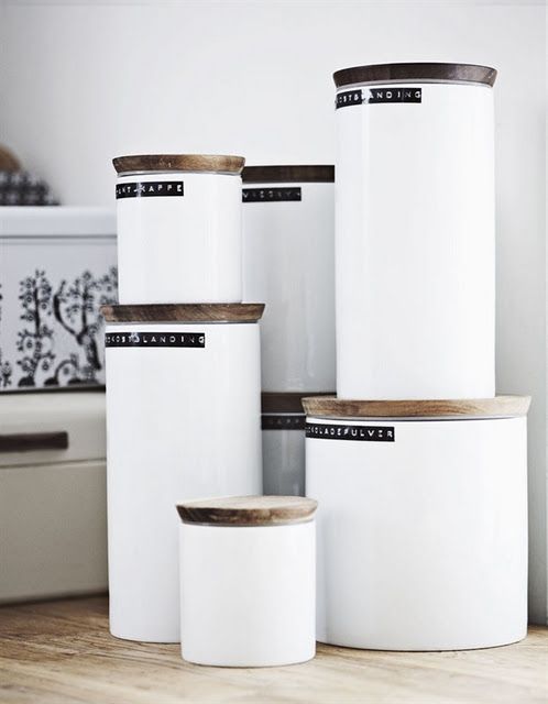 Lables - simple yet effective. No one said you had to have clear containers. Go white. There's something timeless about black labels from the old label maker. Think 1950s office filing systems for your kitchen. 
