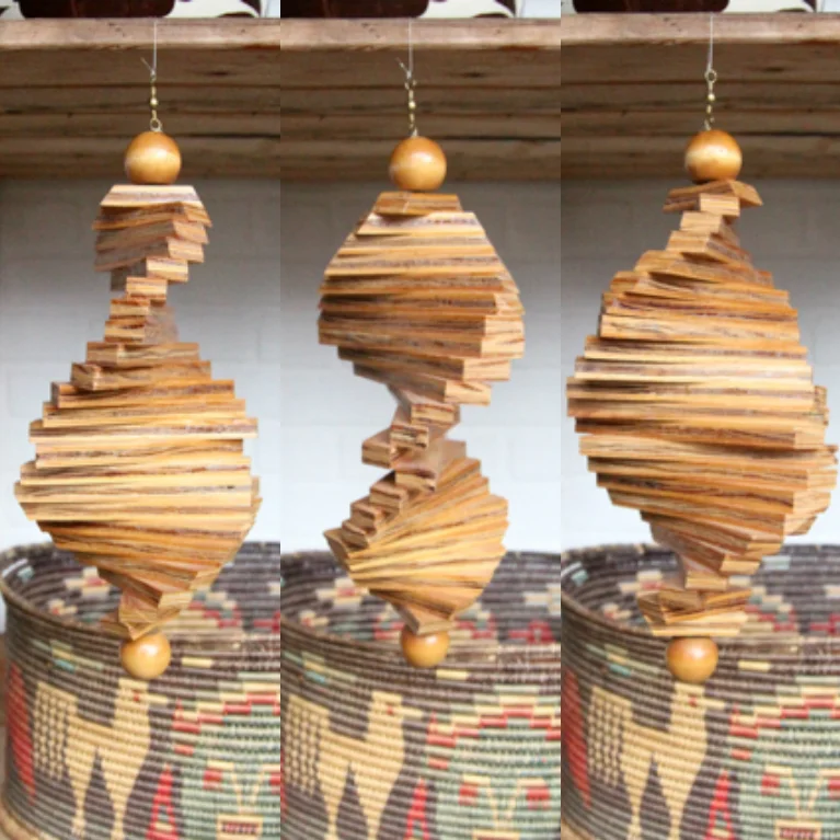 mid century modern hanging wood helix spinner left coast revivals.1.jpg