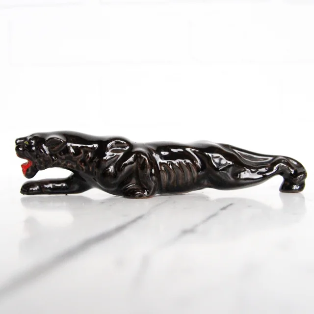 mid century jaguar black panther left coast revivals.1.jpg