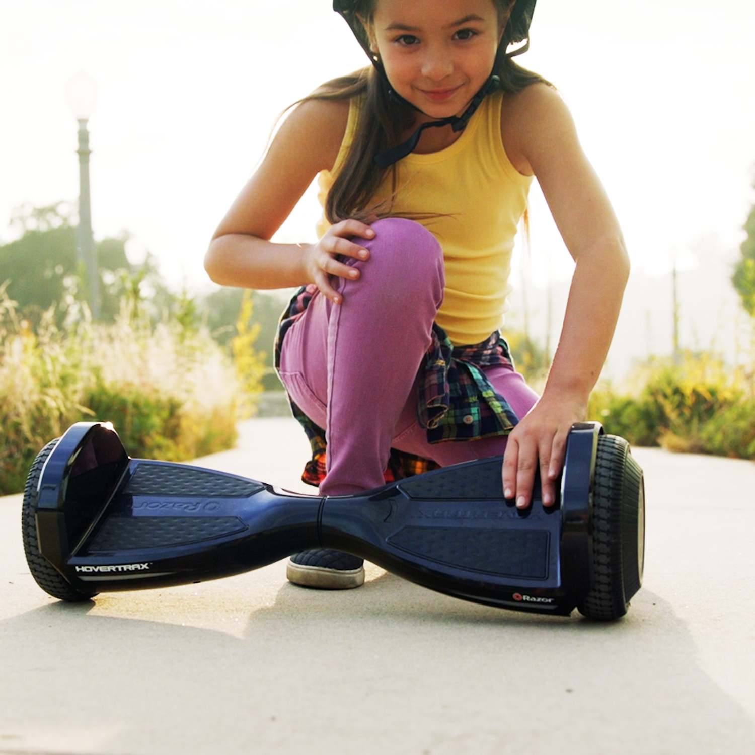 Home_Tile_Hovertrax_Prizma Girl Looking Up.png
