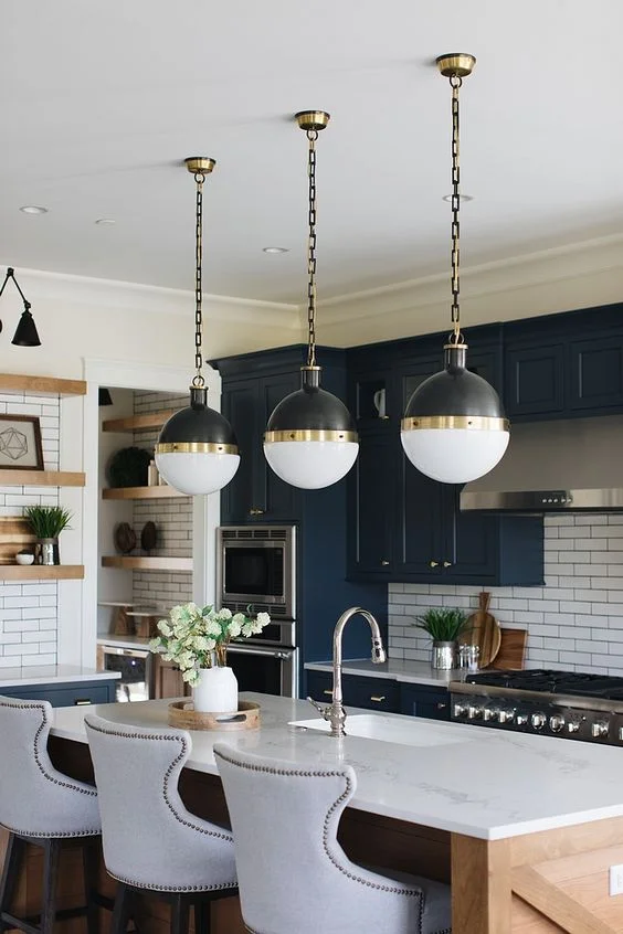 Although chandeliers will always be in style, larger pendants will take over dining rooms to create a warm and inviting feeling for you and your guests. 