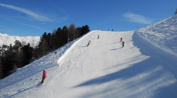Skiing down the majestic Alpine slopes in Livigno