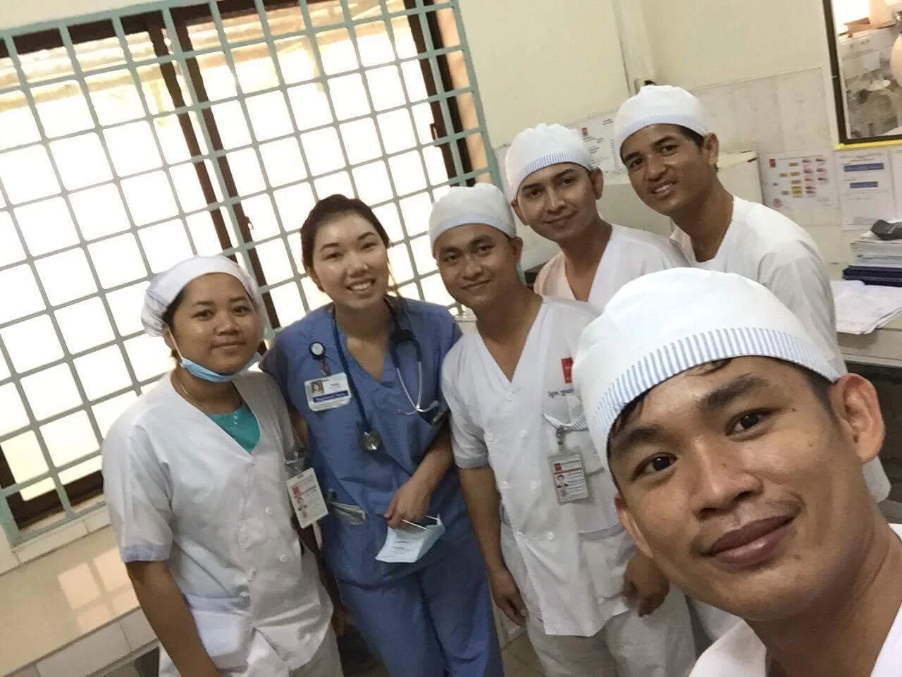 My partner Sumi working with our Calmette Local Nurse Champion partners for some bedside education. Bringing Sepsis and the patient assessment into clinical practice!