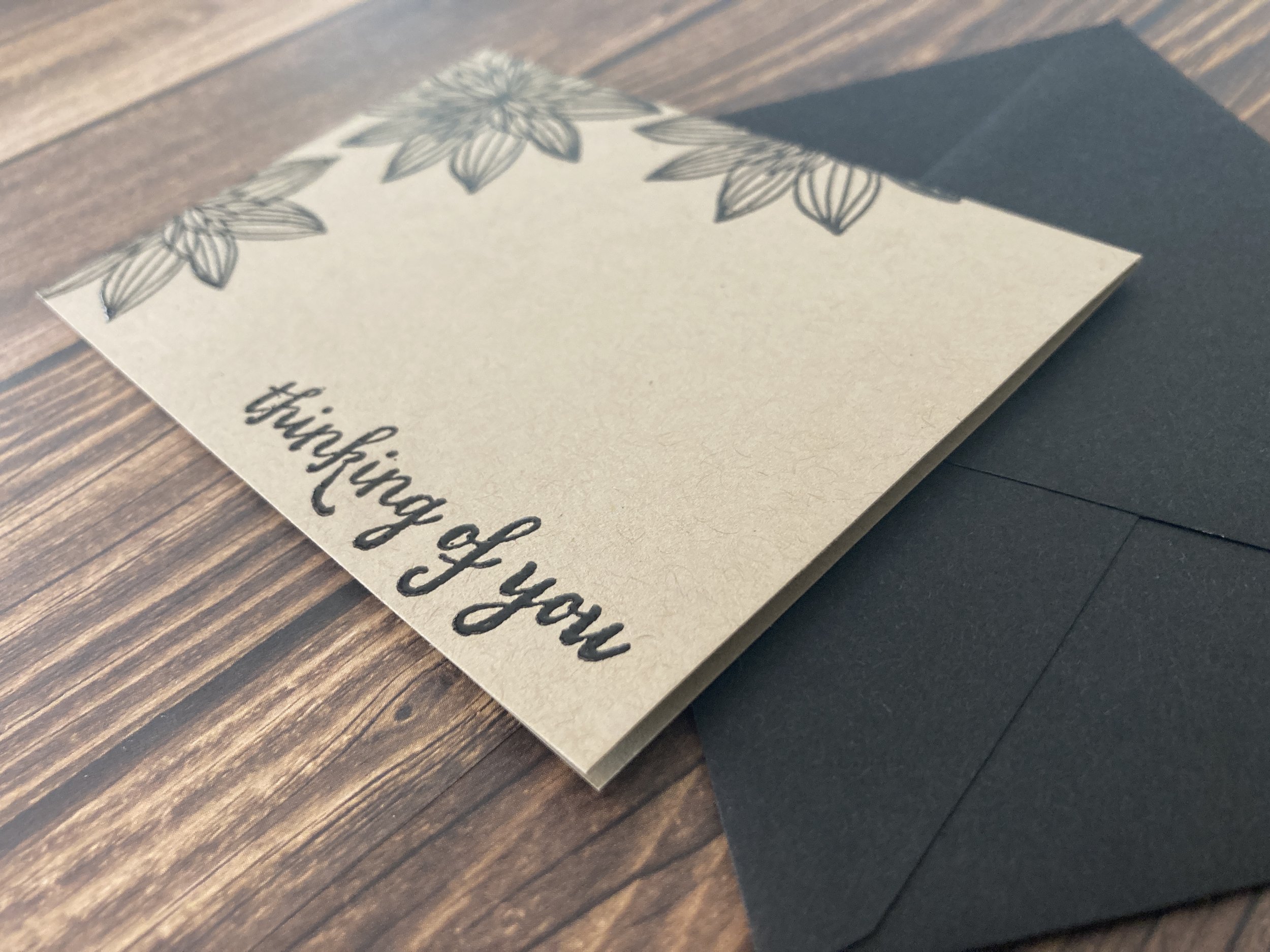 handmade eco-friendly "Thinking of You"greeting card with trio of night-blooming flowers in black ink on kraft cardstock with matching envelope