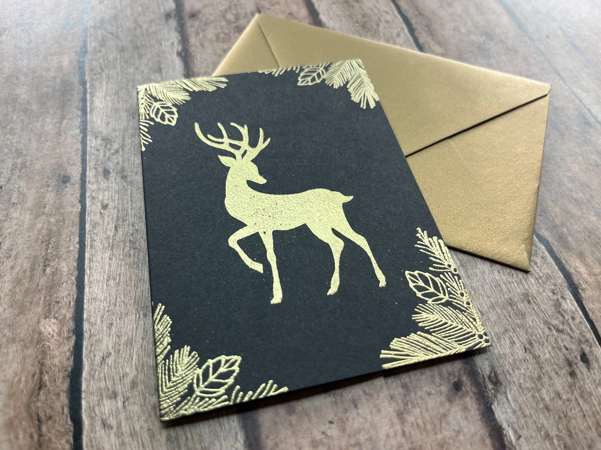 graceful reindeer card - gold on black - 2.jpg