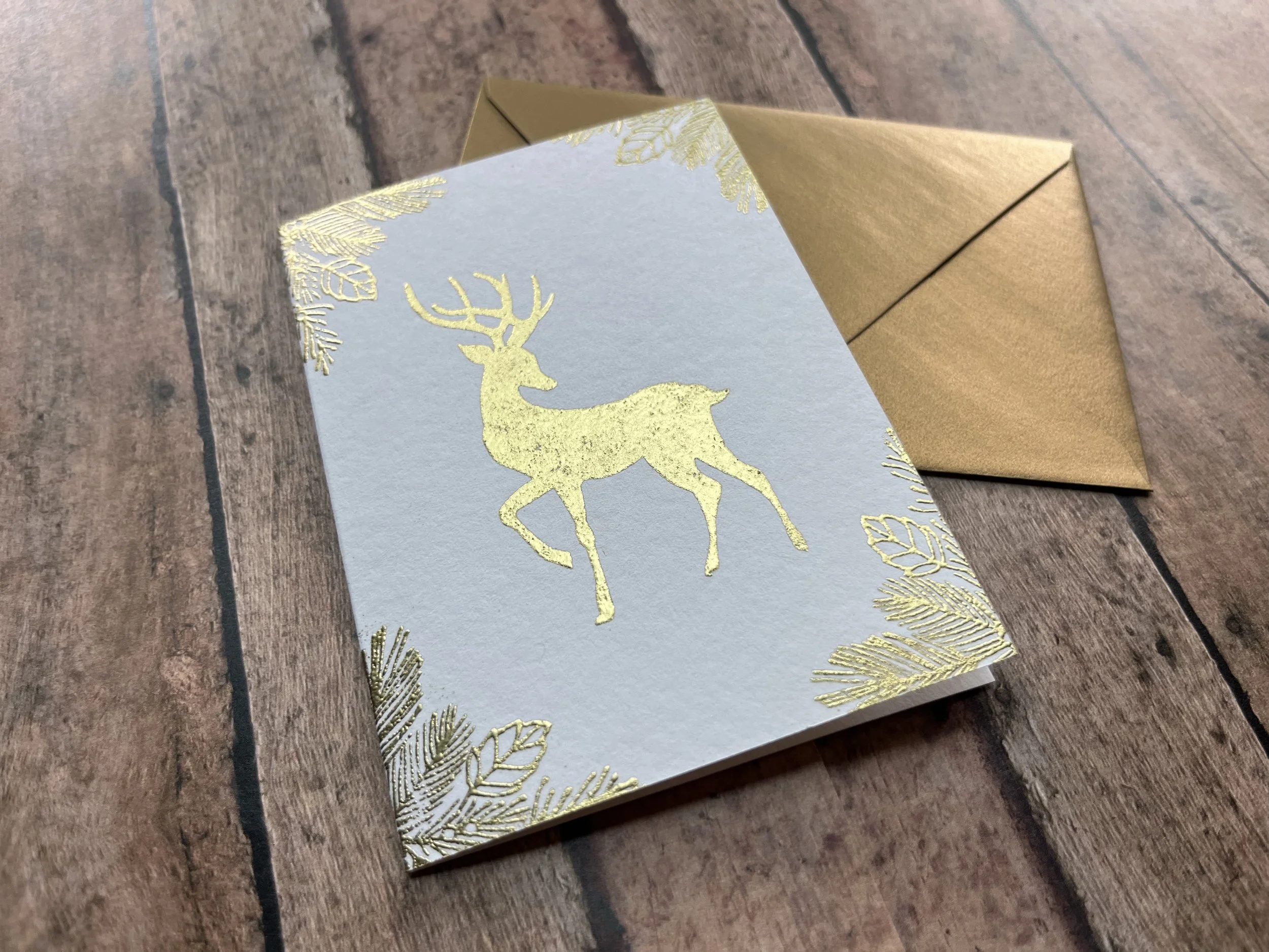 graceful reindeer card - gold on white - 1.jpg
