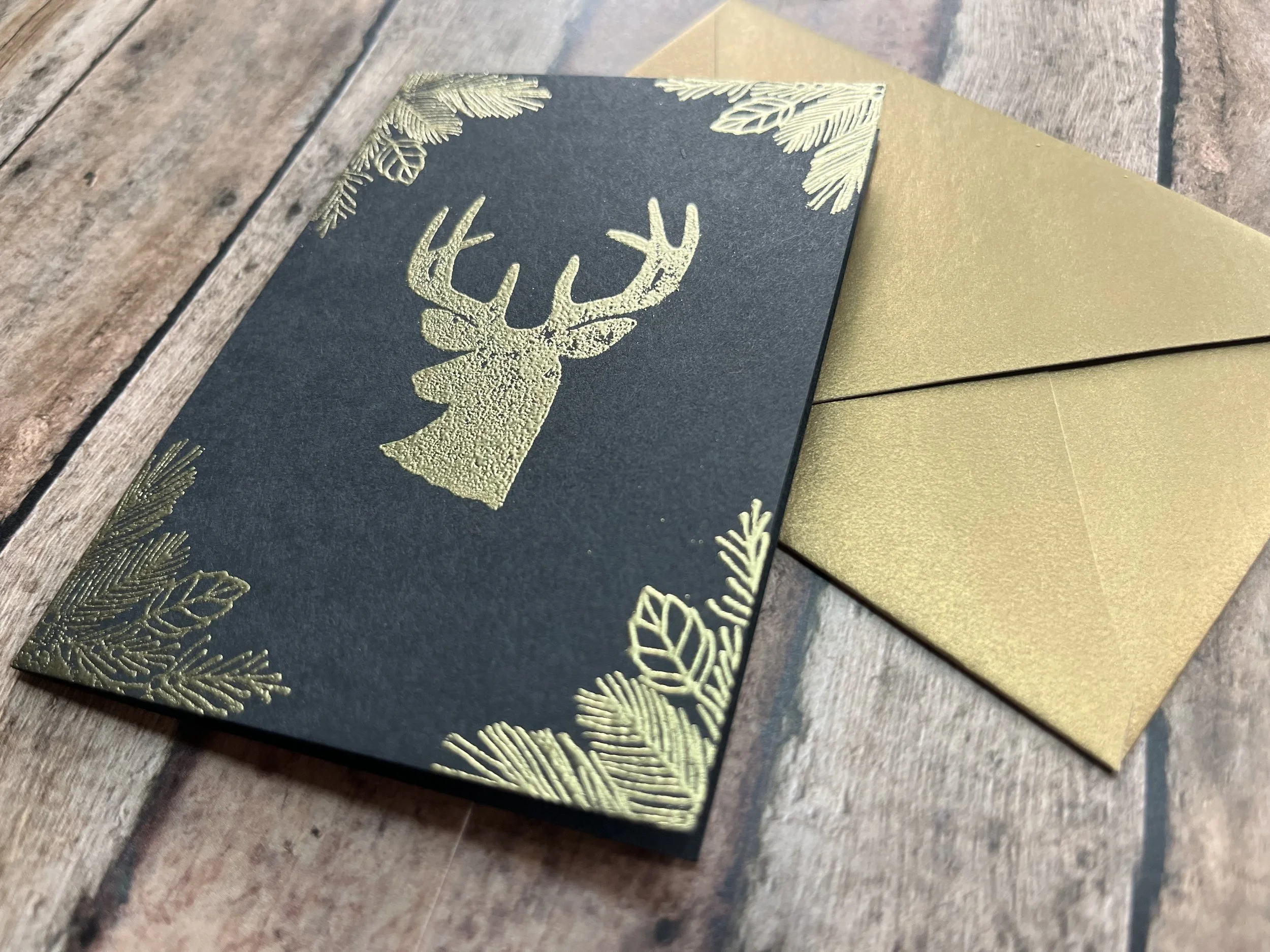 noble reindeer card - gold on black - 3.jpg