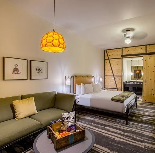 Nectar small half #pendantlight #design in #mustard adding a warm glow to the rooms at #cavalrycourthotel #texasusa