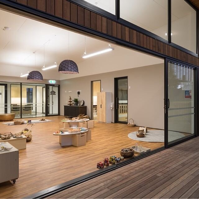 Love the little wooden trucks lined up in the front!  Above we have Designtree's #Nectar #Lamp in Blush for Orchard Park Childcare. Thanks HMMA architects and Waide Construction for the images and the great work. For more photos check out: www.hmma.co.nz/projects/orchard-park-childcare