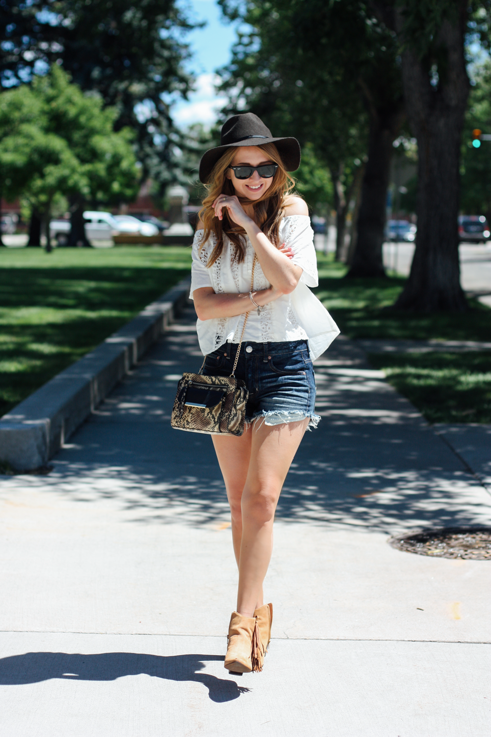 American Eagle hat and denim shorts, Forever 21 off-the-shoulder top, Matisse Footwear Shields booties in Cheyenne, WY via truelane.png