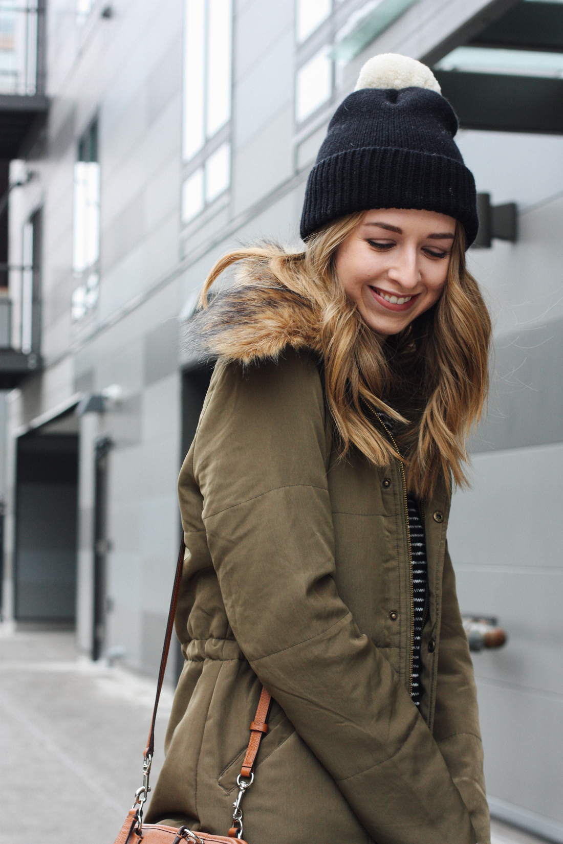 Coach shearling pom hat.png