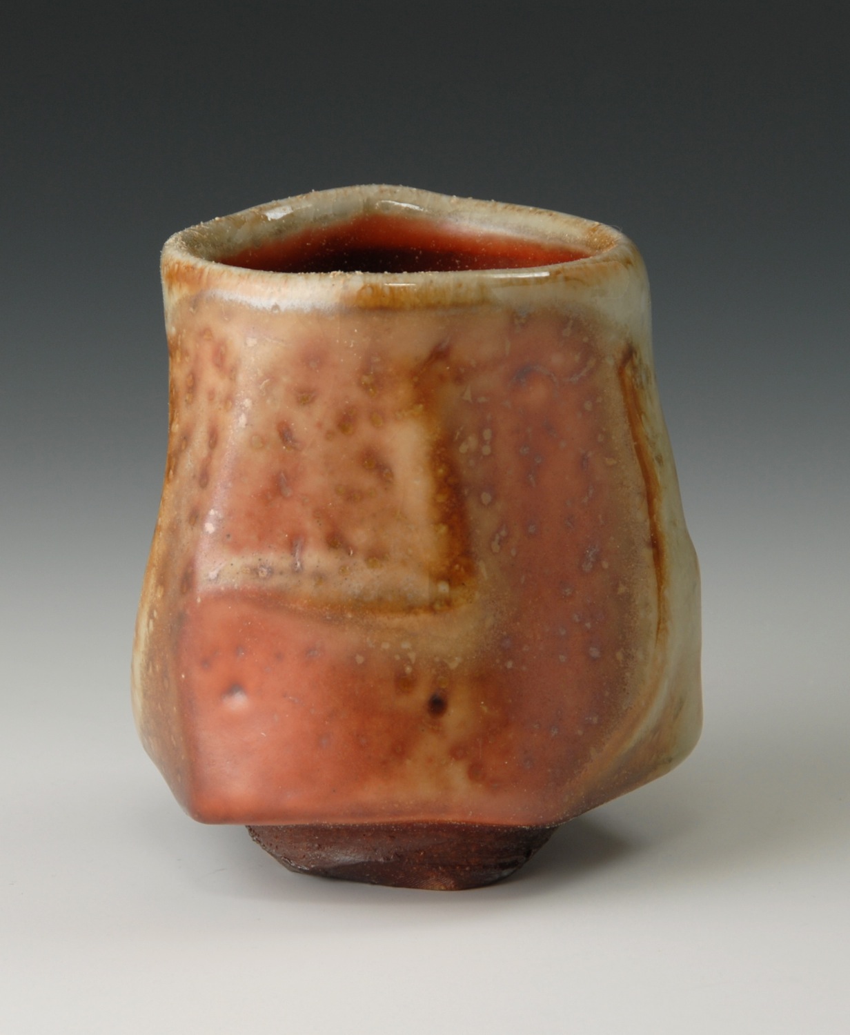 Faceted cup, shino glaze
