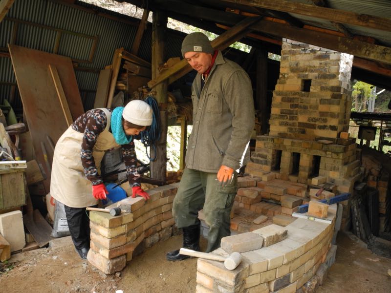 Day 2: Kuni and John building the walls.