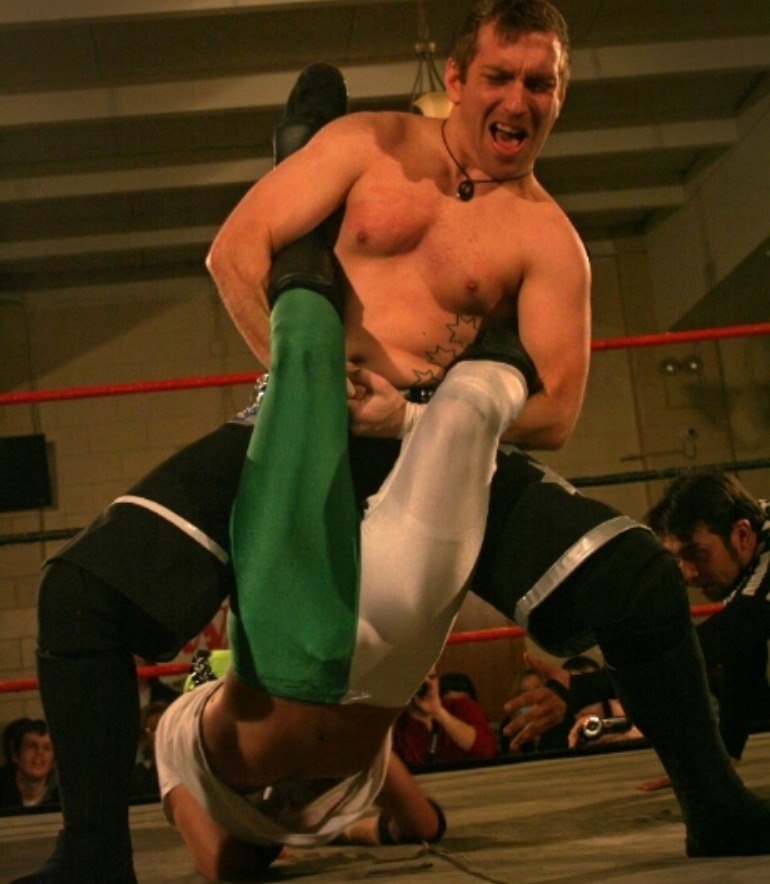  (November 11, 2011) 'Flyin' Steve Williams places Rockstar Max in a wrestling move during a wrestling match in O'Fallon, Ill. 