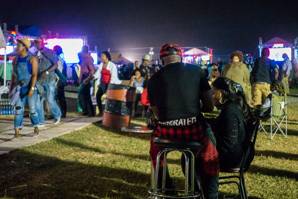 There's no sitting unless you bring your own chair. Many people do.