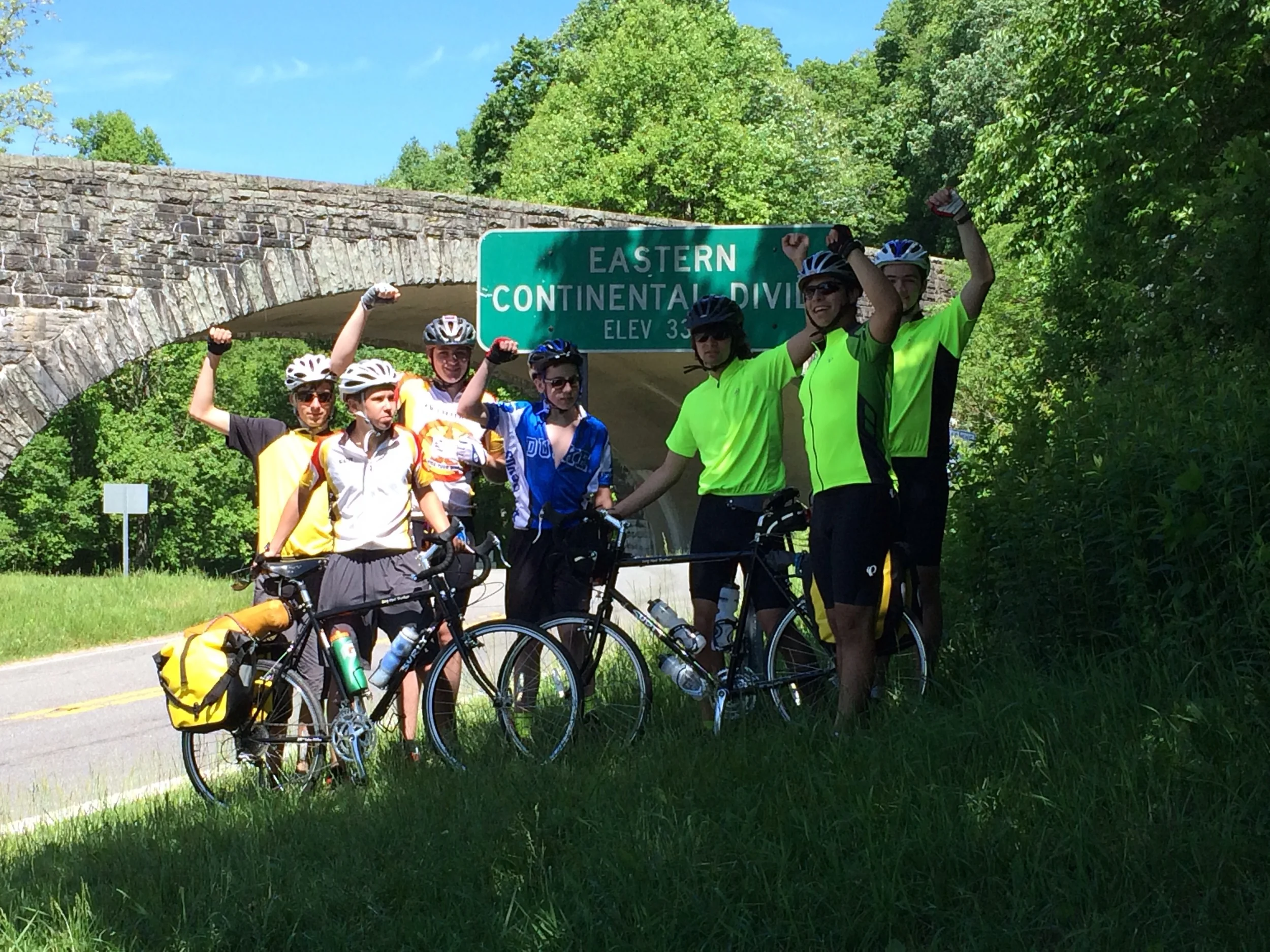 The crew celebrates their arrival to the eastern continental divide.