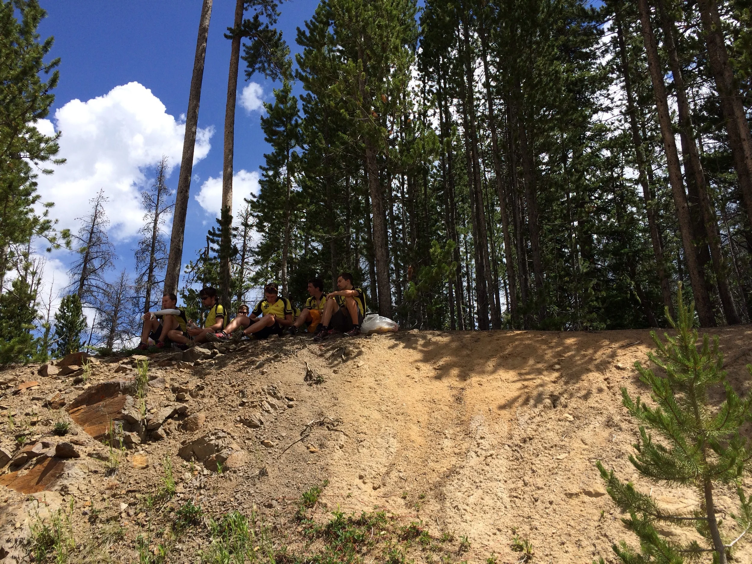 The crew finds a shady spot to hang out on Willow Creek Pass.