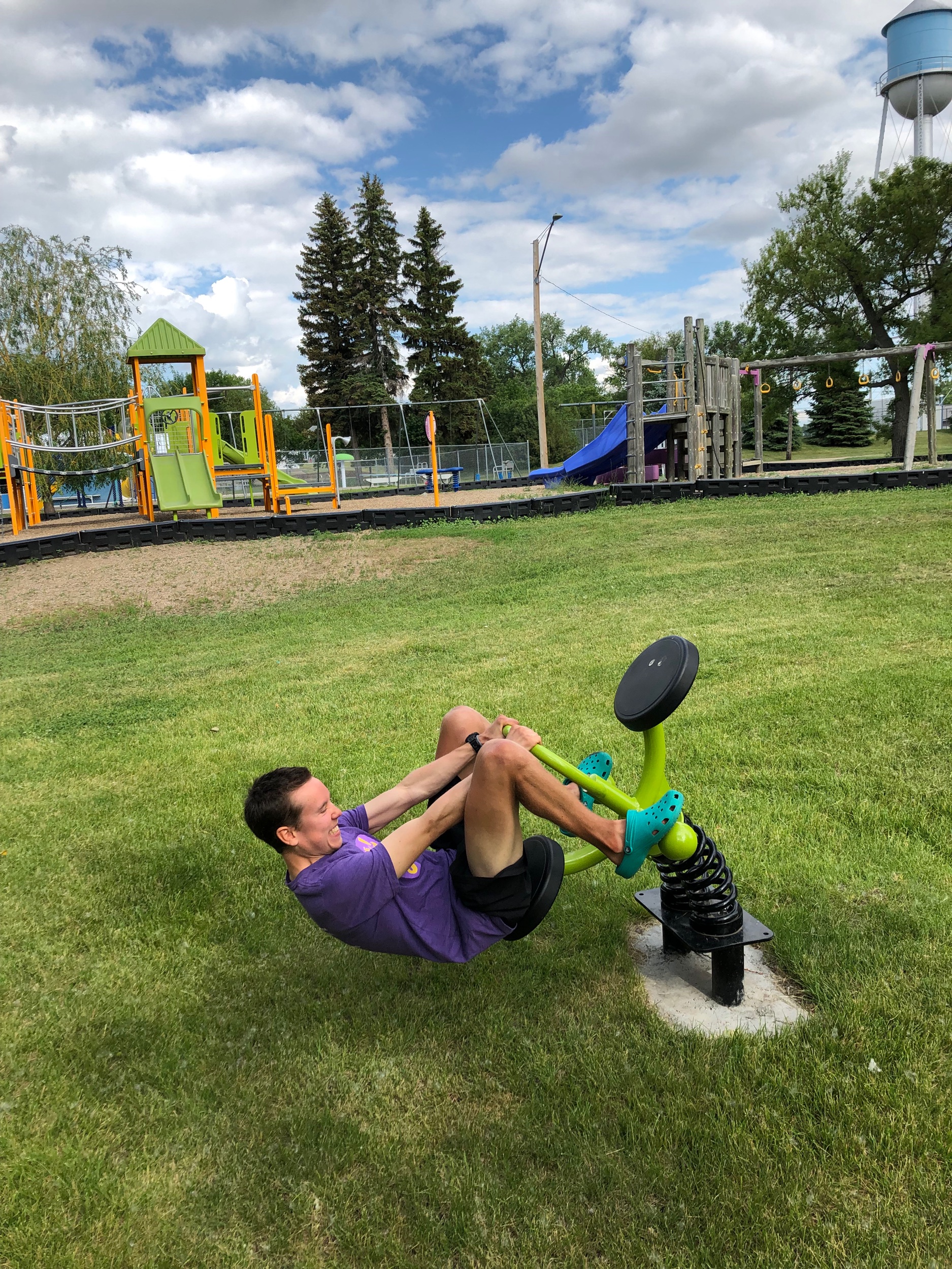 Brian playing on the playground