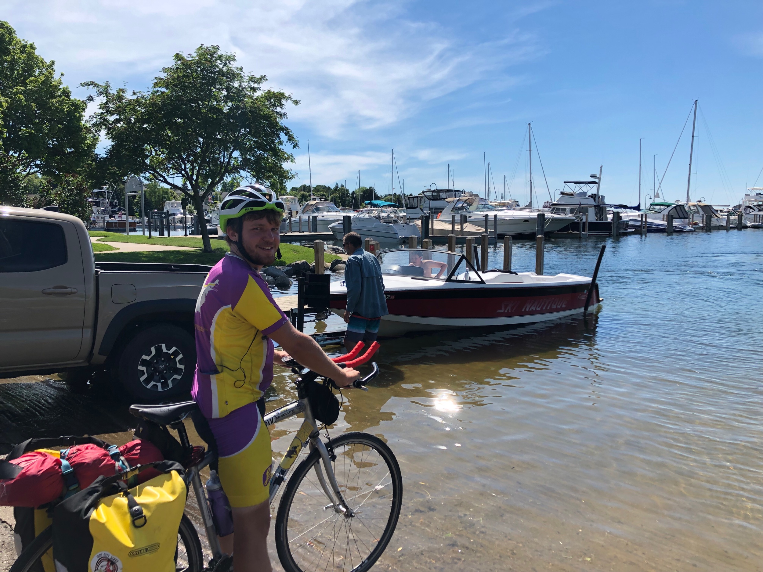 Wes dips his tire in Lake Michigan