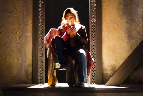 Kat Lozano in the university workshop production of The Orange Garden . Photo and lighting design by Kate Ducey. 