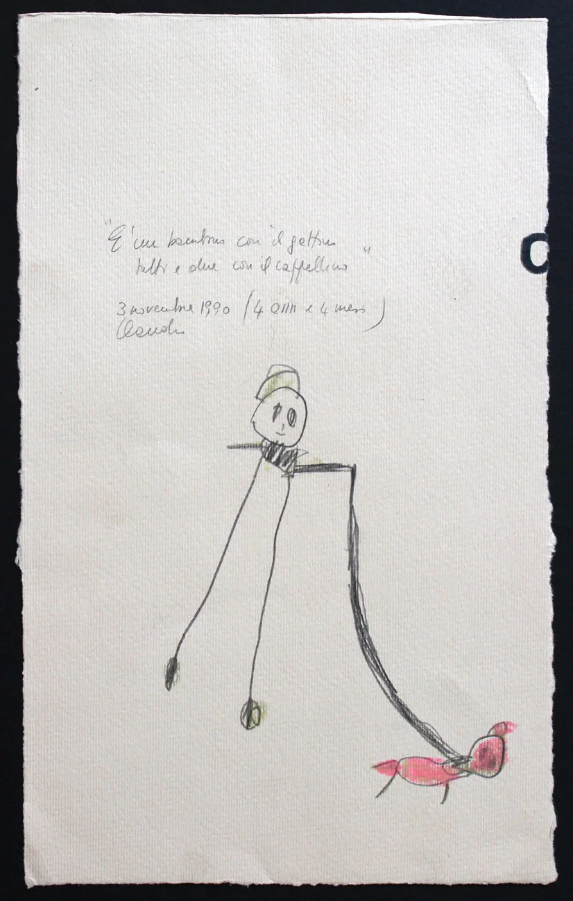 "It's a kid with a little cat, both of them wearing a hat" 3 November 1990 (4 years and 4 months old)