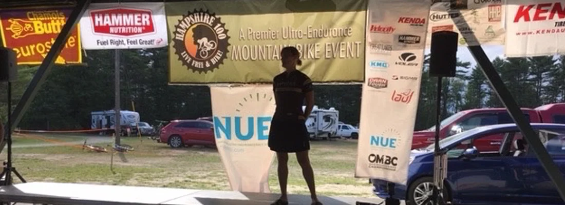 Robyn, in silhouette, awaiting here 3rd Place Prize.
