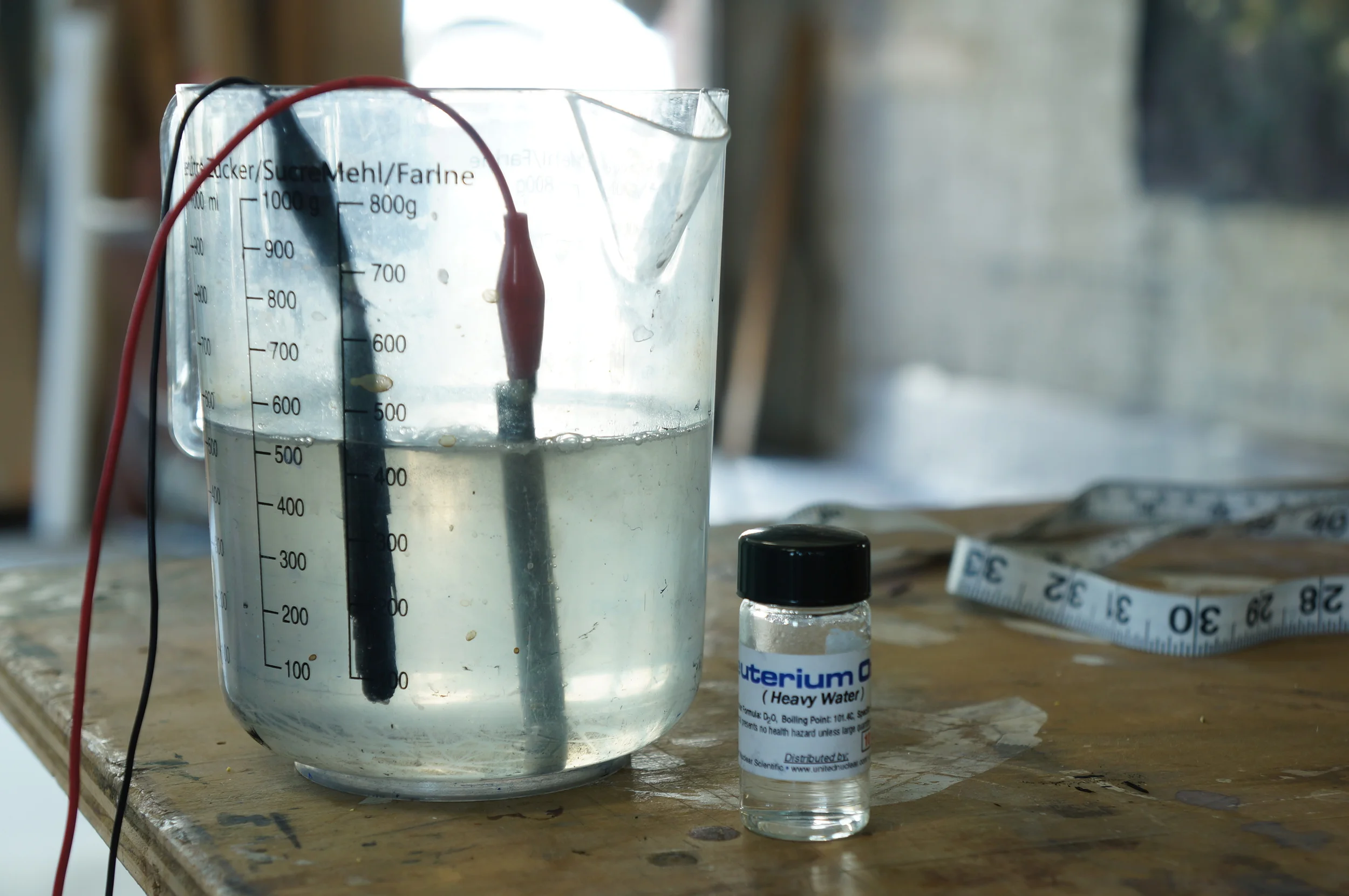 Generating water close in composition to the comet's 67P water by using electrolysis to concentrate D2O.