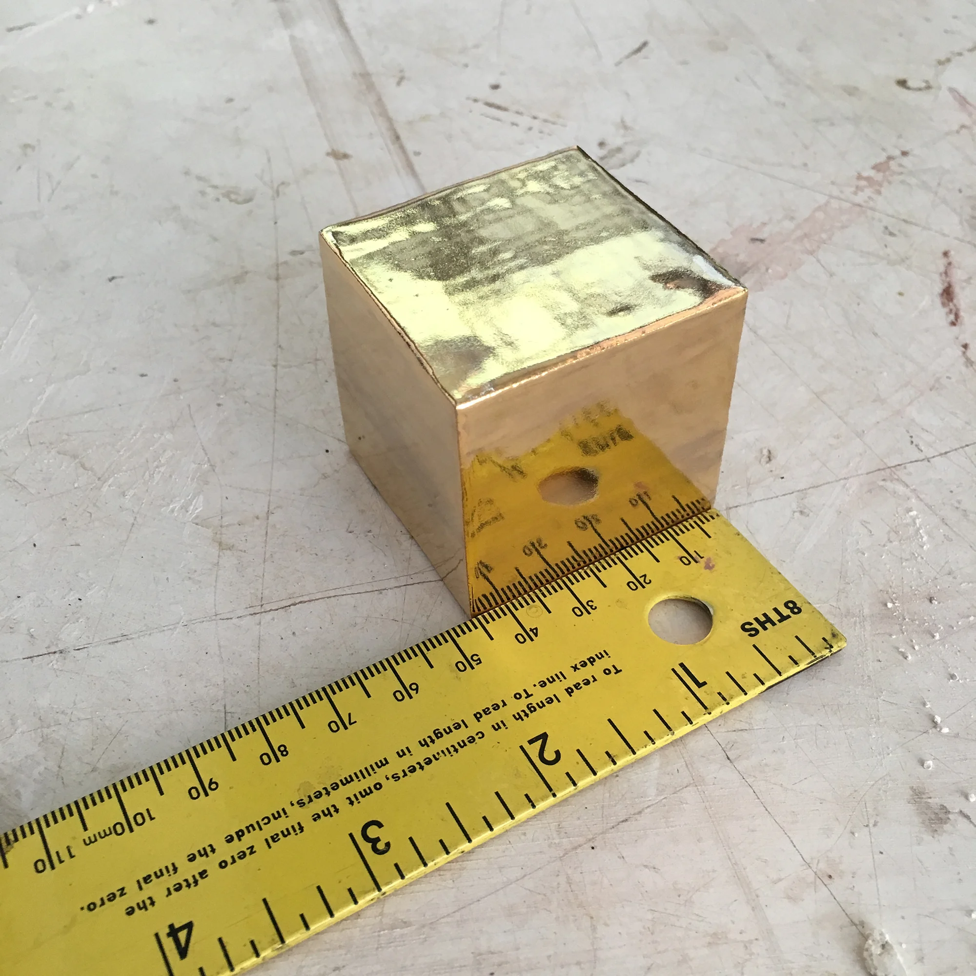  Ceramic gold cubes are hand-built replicas of those found on the LISA Pathfinder spacecraft. To achieve the exact size of 46mm (1.8")&nbsp;per side was very challenging due to the nature of shrinking ceramics during firings.  Blog:  working on the s