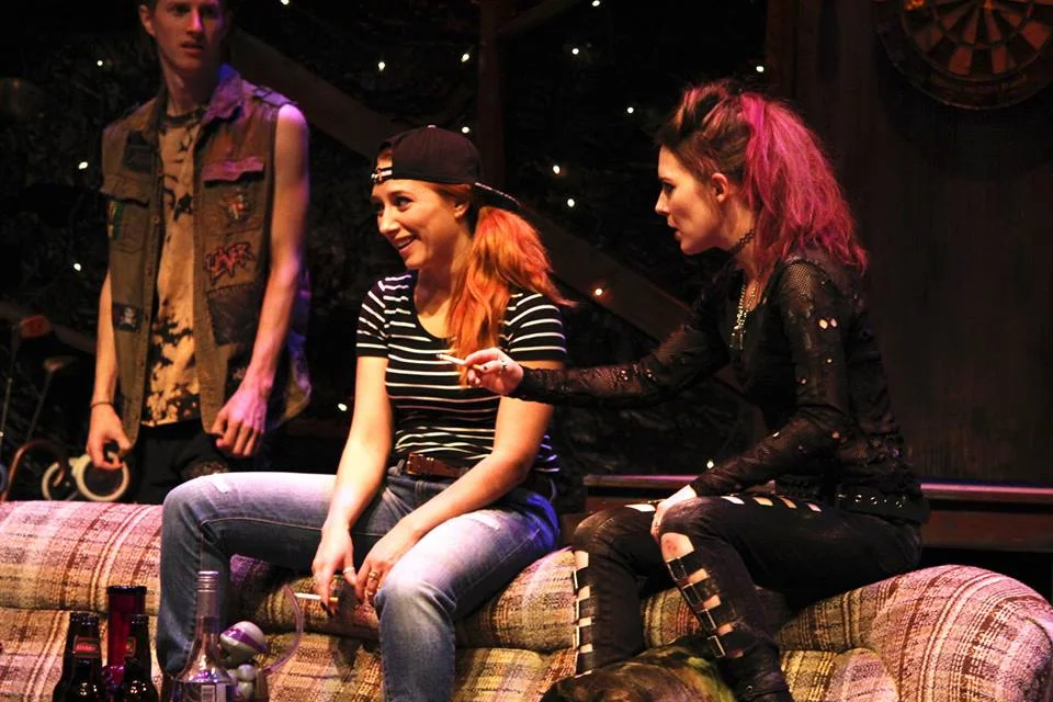 STRANGE COSTUMING CHOICES MAKES IT LOOK LIKE SOME OF THE CHARACTERS JUST ARRIVED FROM 1995 VIA A TIME MACHINE. PHOTO COURTESY OF ALBERTA THEATRE PROJECTS. 