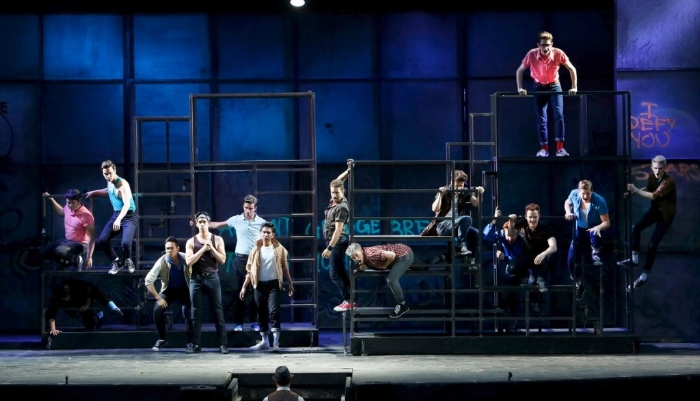 The Sharks and the Jets in Theatre Under The Stars' production of West Side Story. Photo credit: Tim Matheson. 