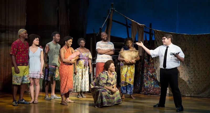 Peirson and the ensemble of The Book of Mormon. Photo credit: Julieta Cervantes