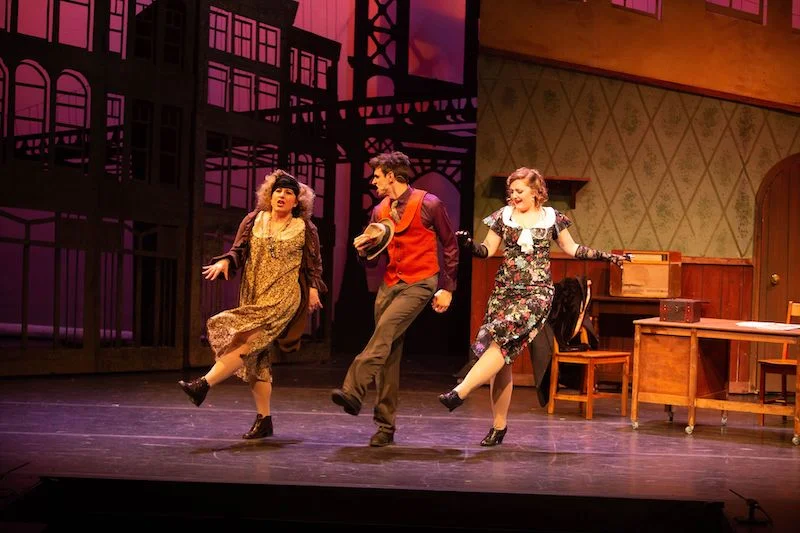 From left to right: Erin Matchette as Miss Hannigan, Daniel Curelli as Rooster Hannigan, and Leah Newson as Lily St. Regis. Photo credit: Anita Alberto