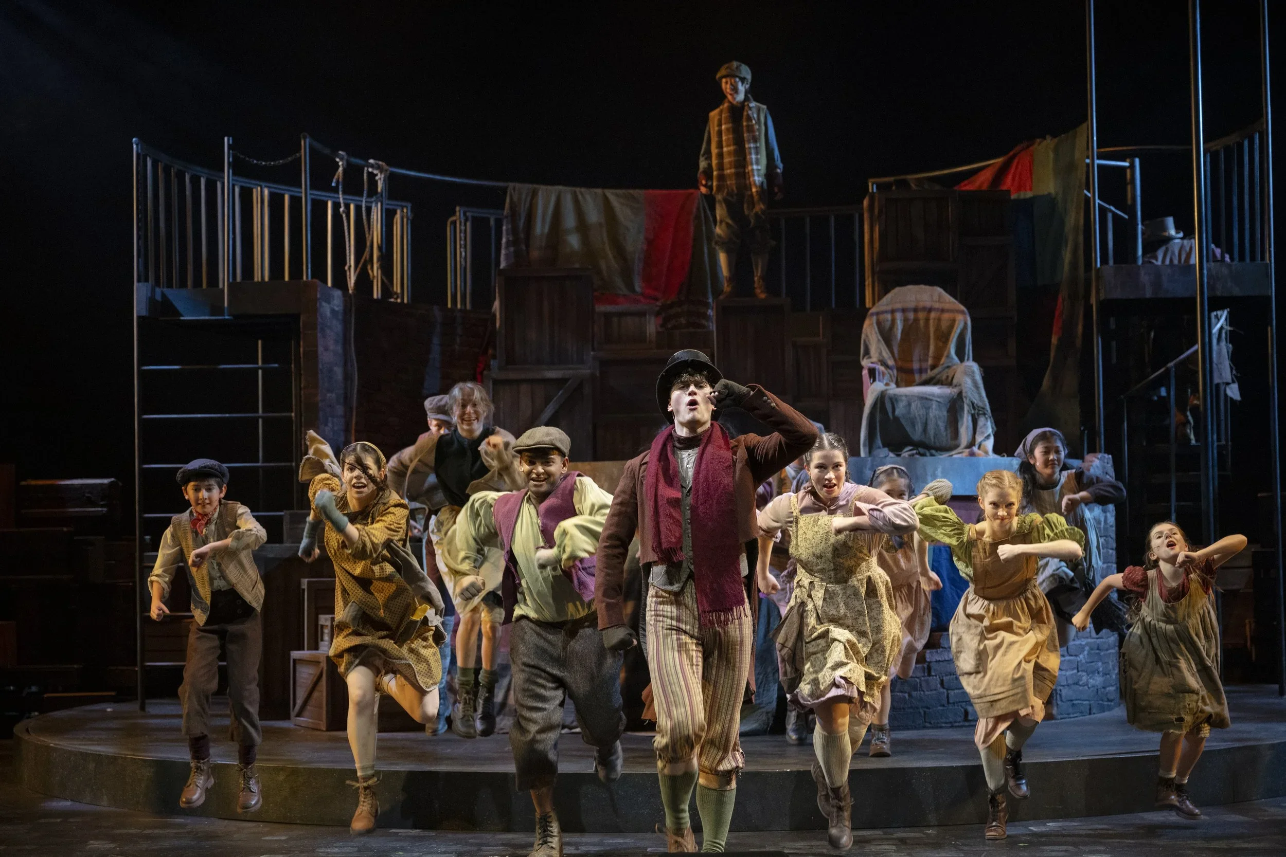 Strong singing and dancing over darkness in Gateway Theatre's Oliver!