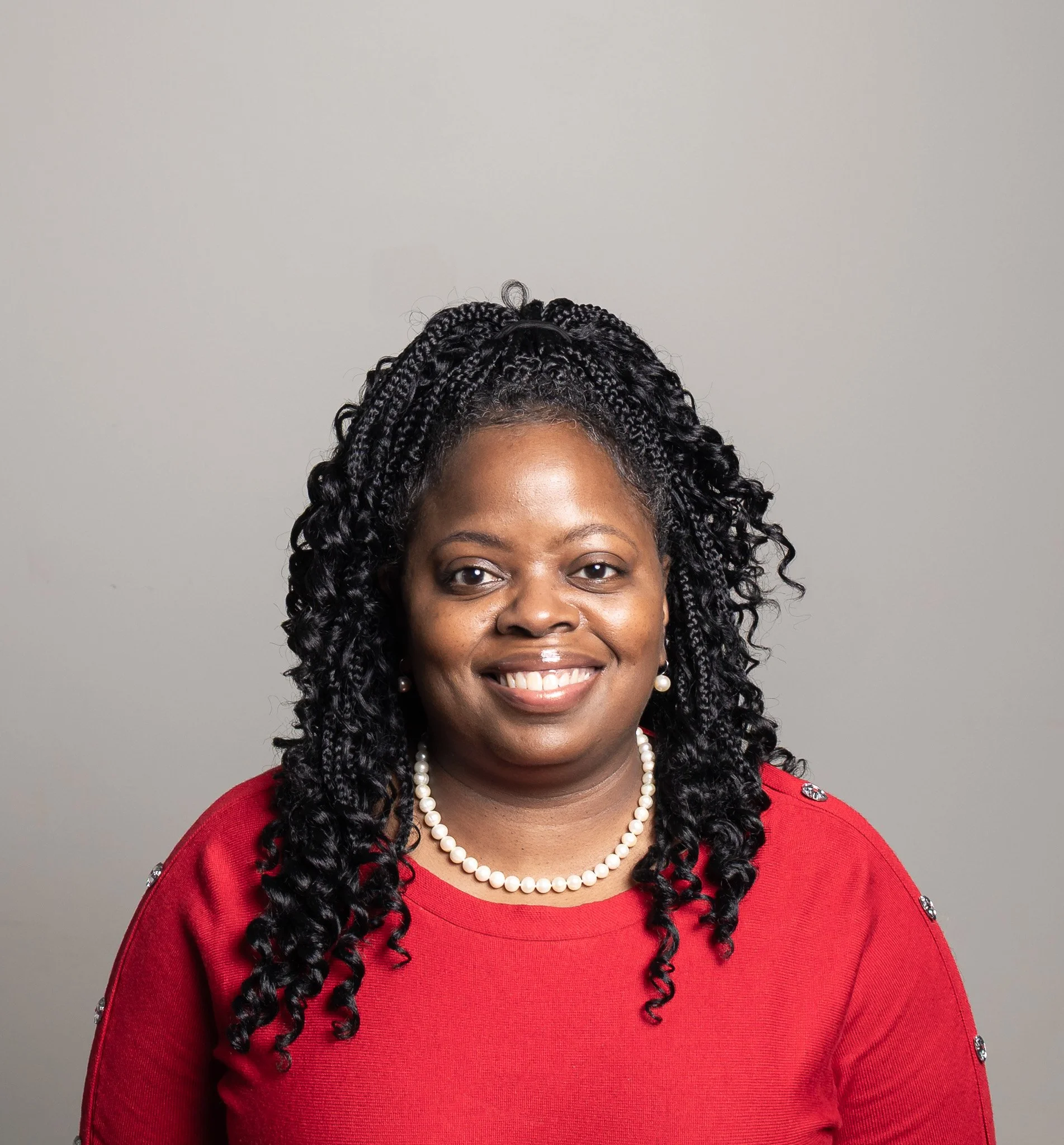 Ingrid Barton professional portrait. Bridges Pointe NC INC Board Chair headshot. Leadership in nonprofit organization. Black women executive photography.