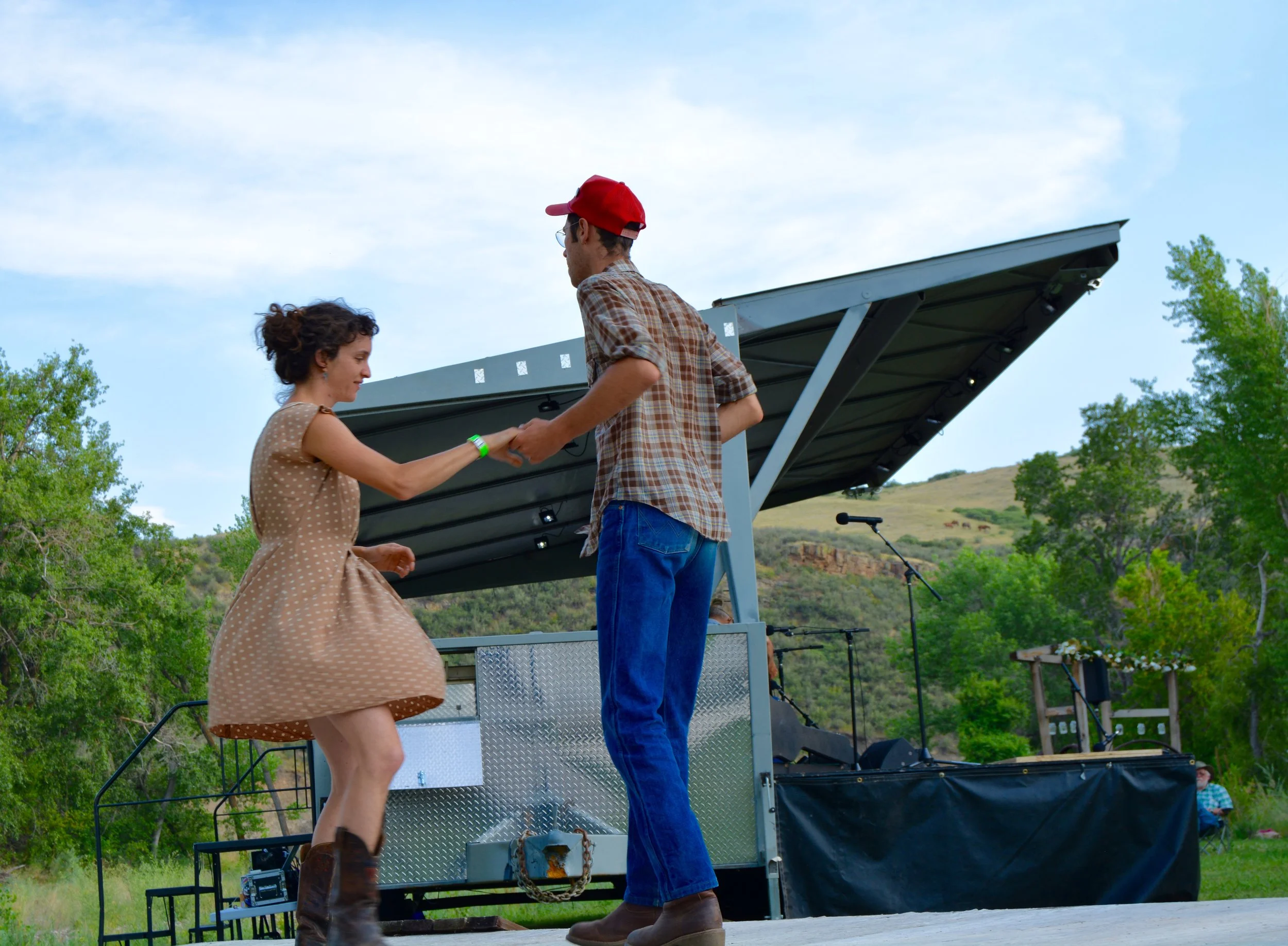 Aviva Steigmeyer & Roy Pilgrim of the Ozark Highballers join in on the festival dancing.