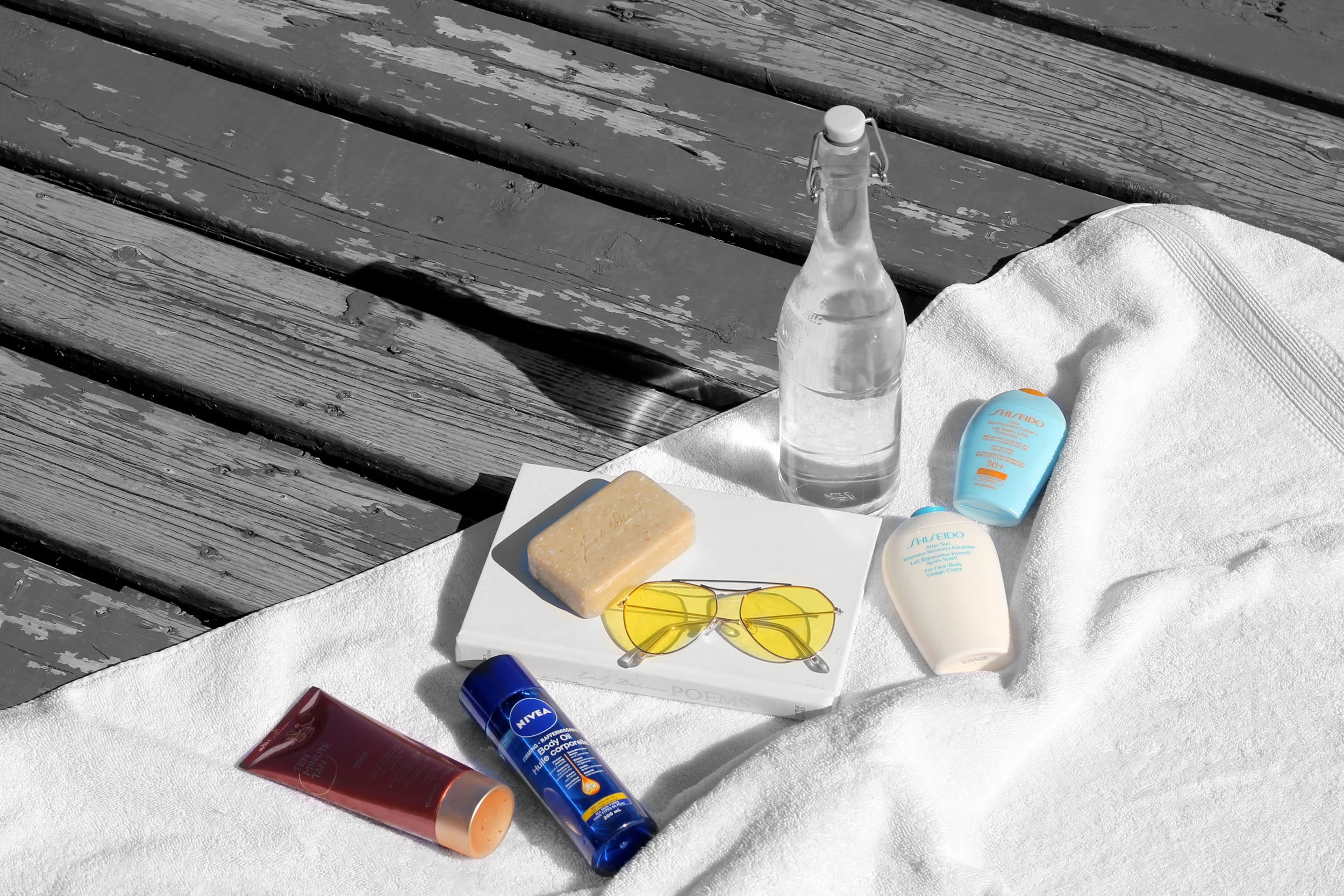 Best Products To Achieve and Maintain a Summer Tan including Vita Liberate Ten Minute Tan, Nivea Q10 Firming Body Oil, Shiseido After Sun, Sunscreen and Jack Black Turbo Body Bar