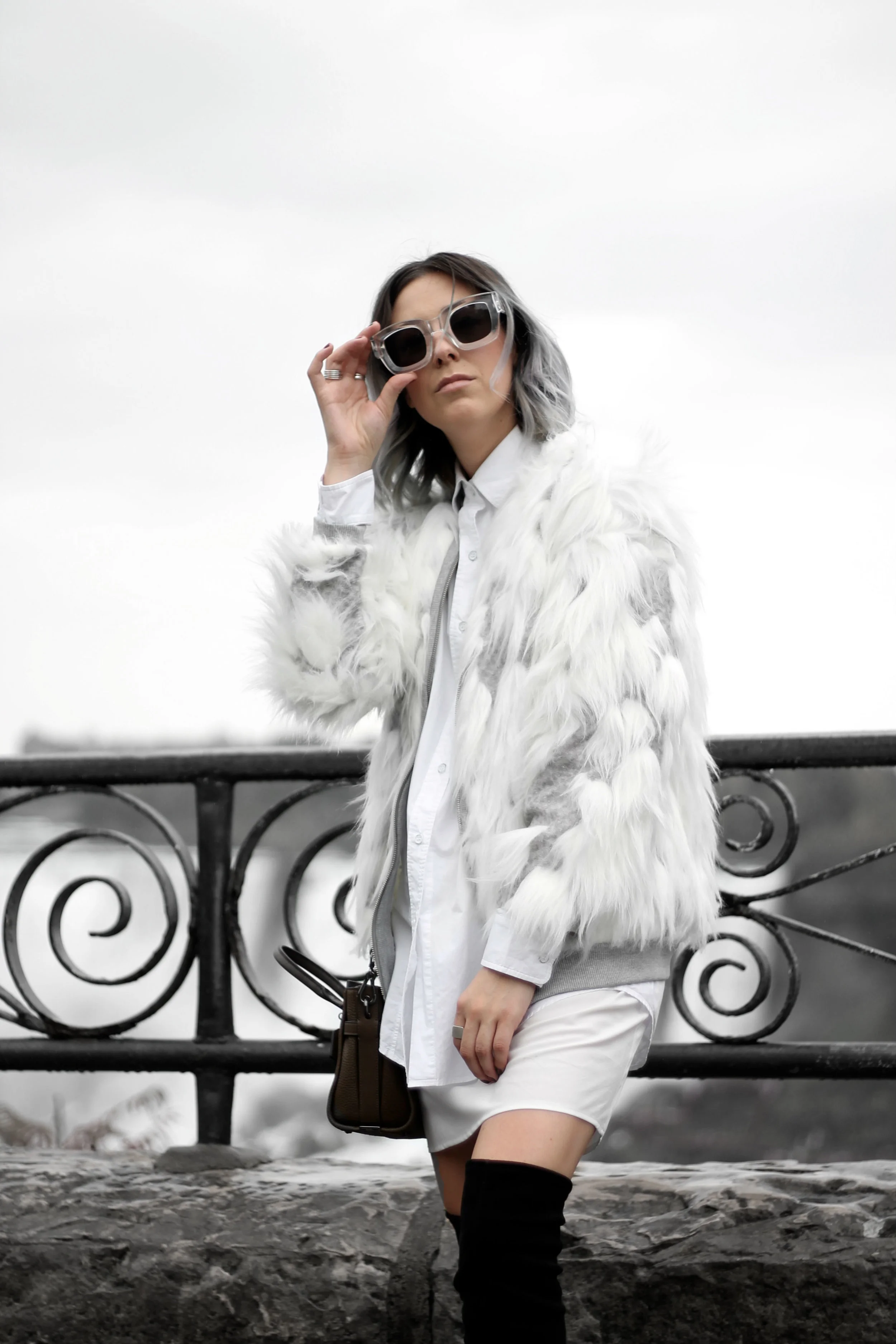 Bratty B posing in faux fur in front of Niagara Falls, ON Canada taken by Elaisha Jade
