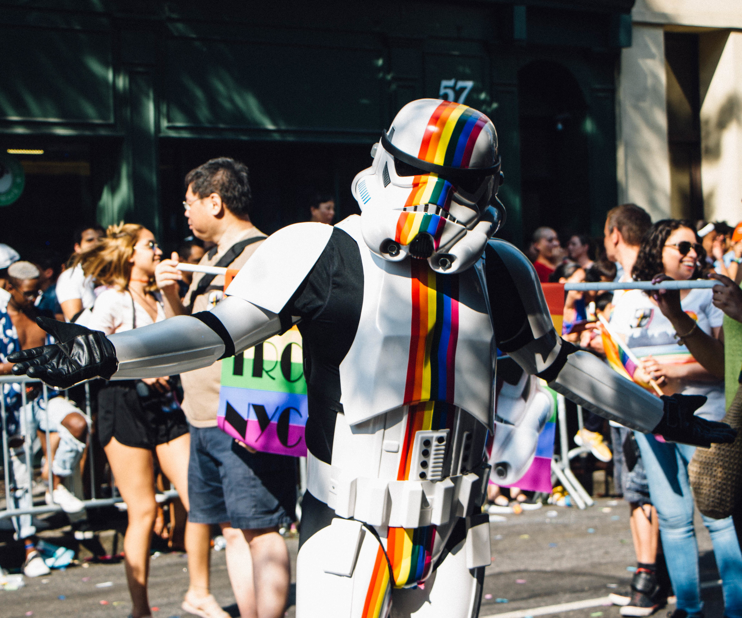 A gay pride Storm Trooper poses for cameras.