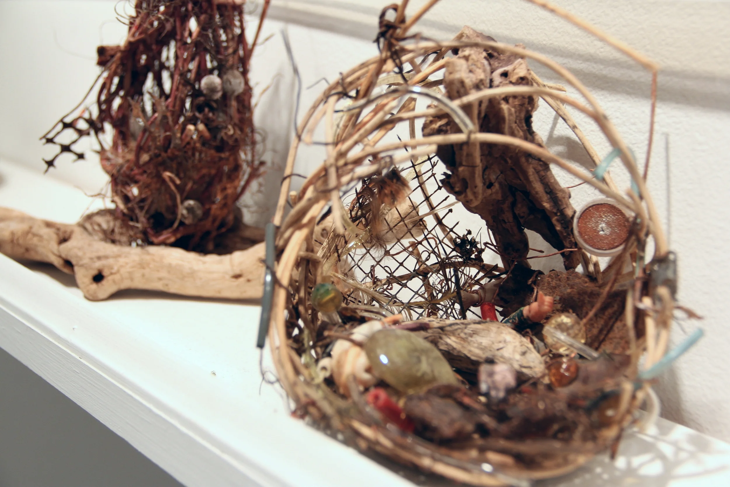 Detail of sculptural images by Kathy Dragomer.