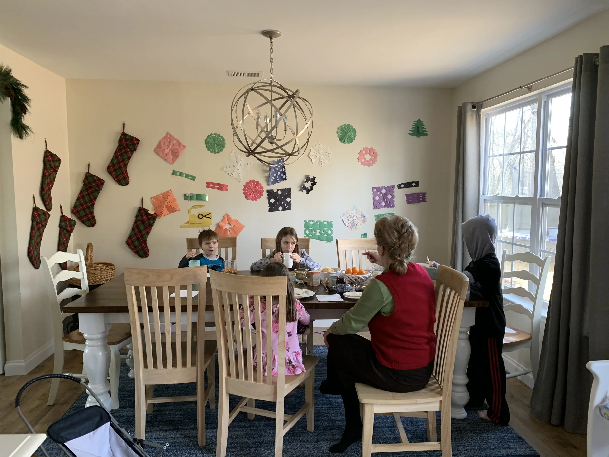 Her and the kids having tea. They always get so excited when I randomly host unexpected tea parties. they seem to be on their best behavior and everyone jumps in to help out! I love it!!!
