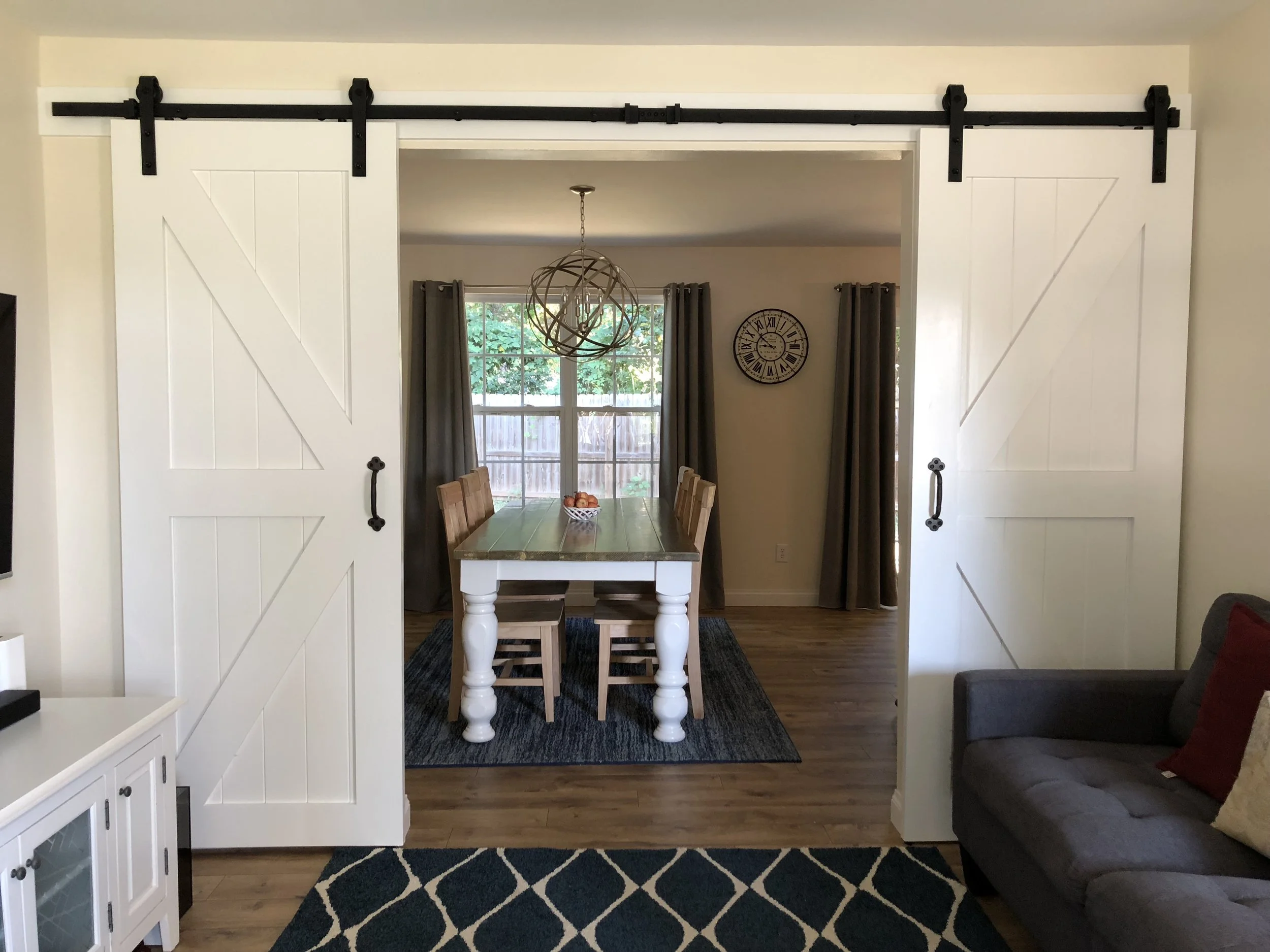 It didn’t happen right away but after some time my sweet husband built me some gorgeous barn doors. I absolutely love them! In the beginning I thought I wanted the popular “open concept” kind of feel in my home but after a while I quickly realized that, that style doesn’t really work for me. Or at least not right now while the kids are still little. I personally like to close them behind the doors, while having some tea time with a friend. The more peace and quiet the better. haha