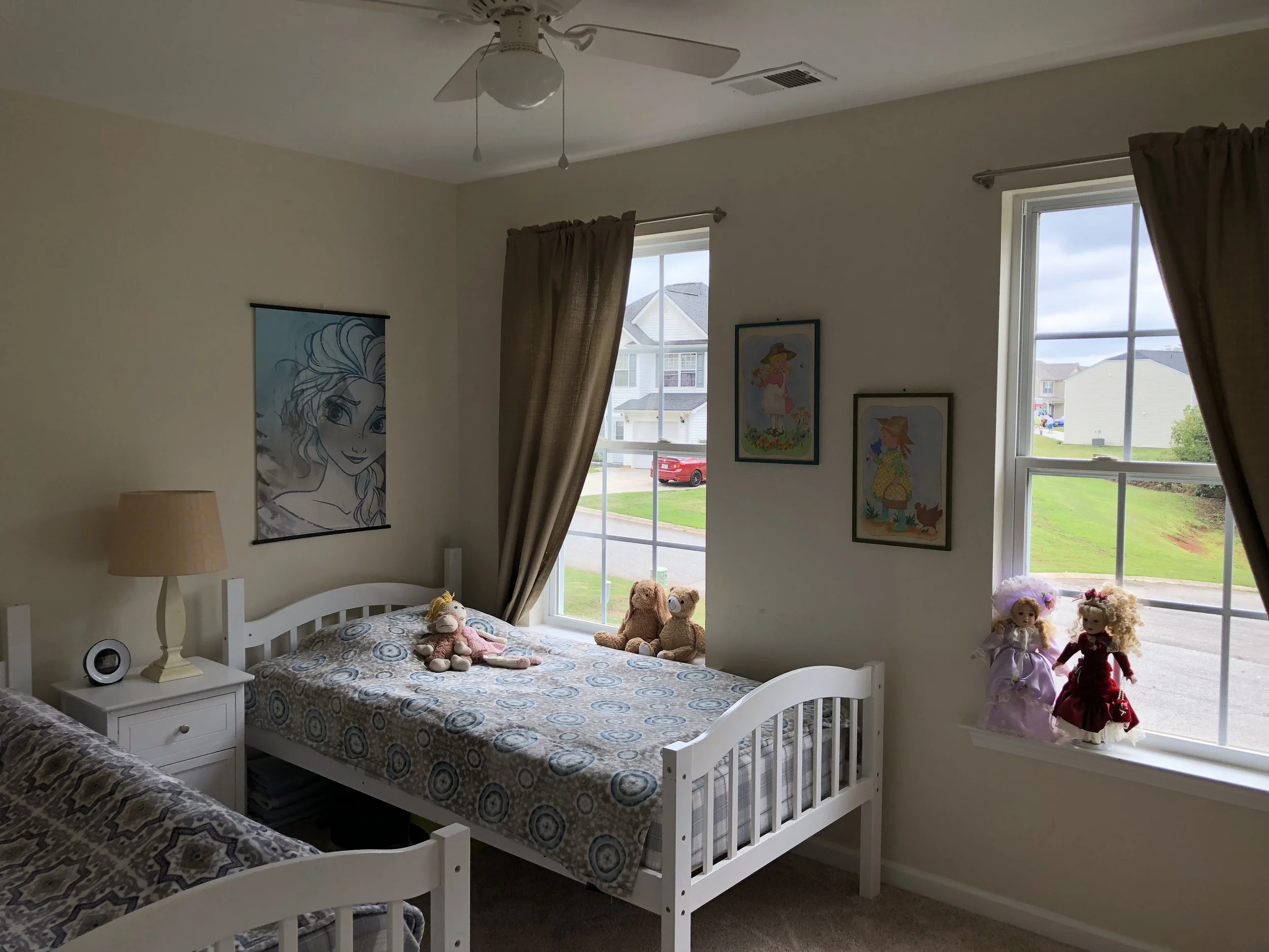 We also removed all the popcorn ceilings and my parents did an awesome paint job! For the bedrooms we changed out the carpet, put on a fresh coat of paint and put in fans.