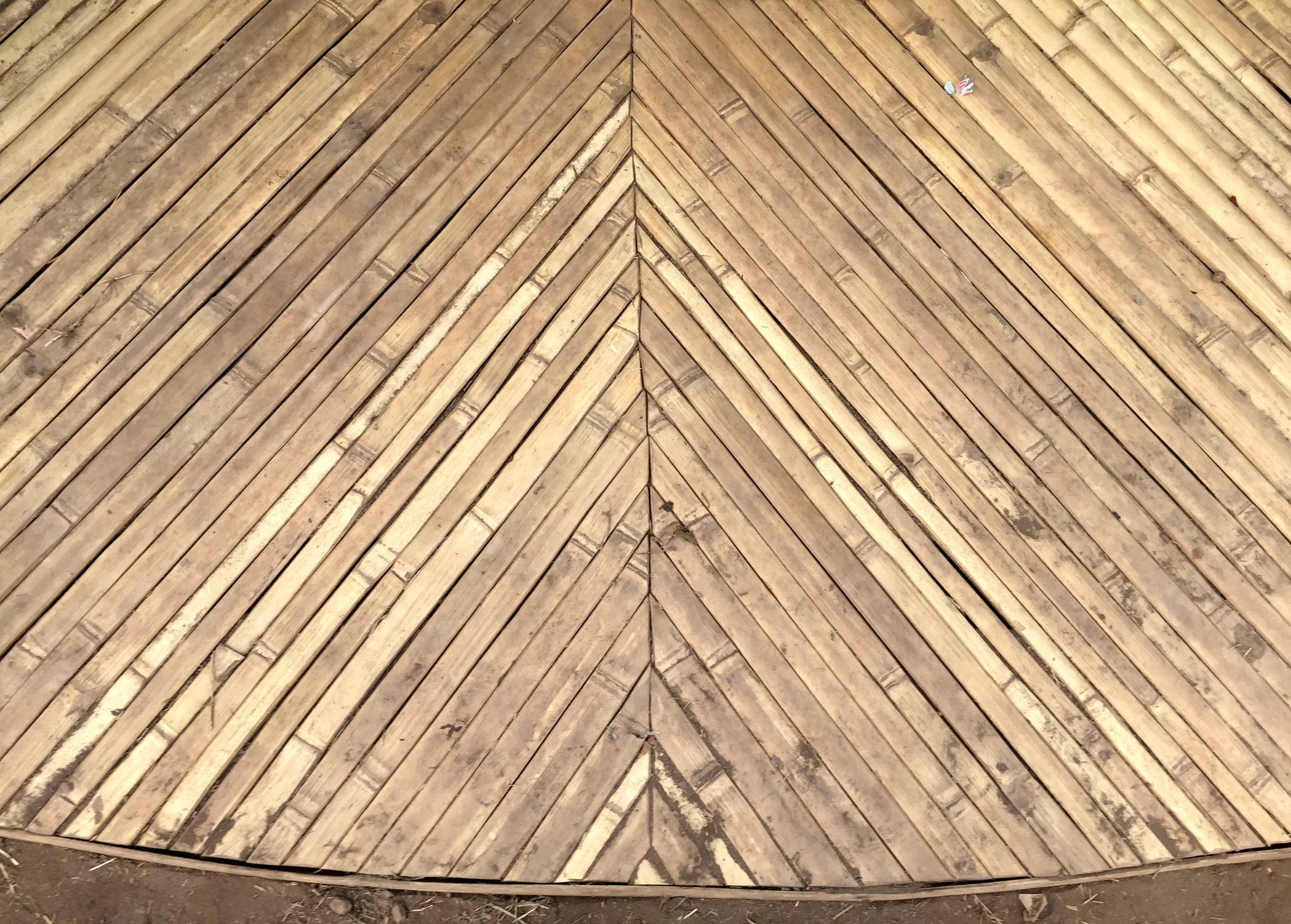 the meticulously constructed bamboo threshold-deck 