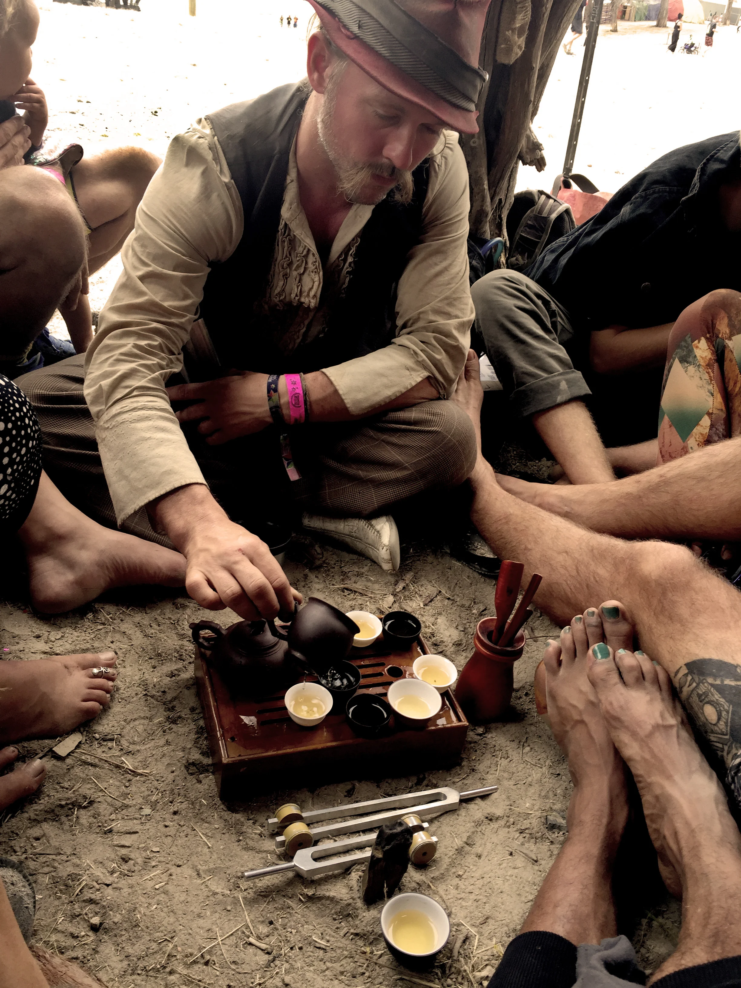 Tyson Ayers serving a beautiful gongfu tea ceremony inside Dingo Ma's belly on Monday afternoon