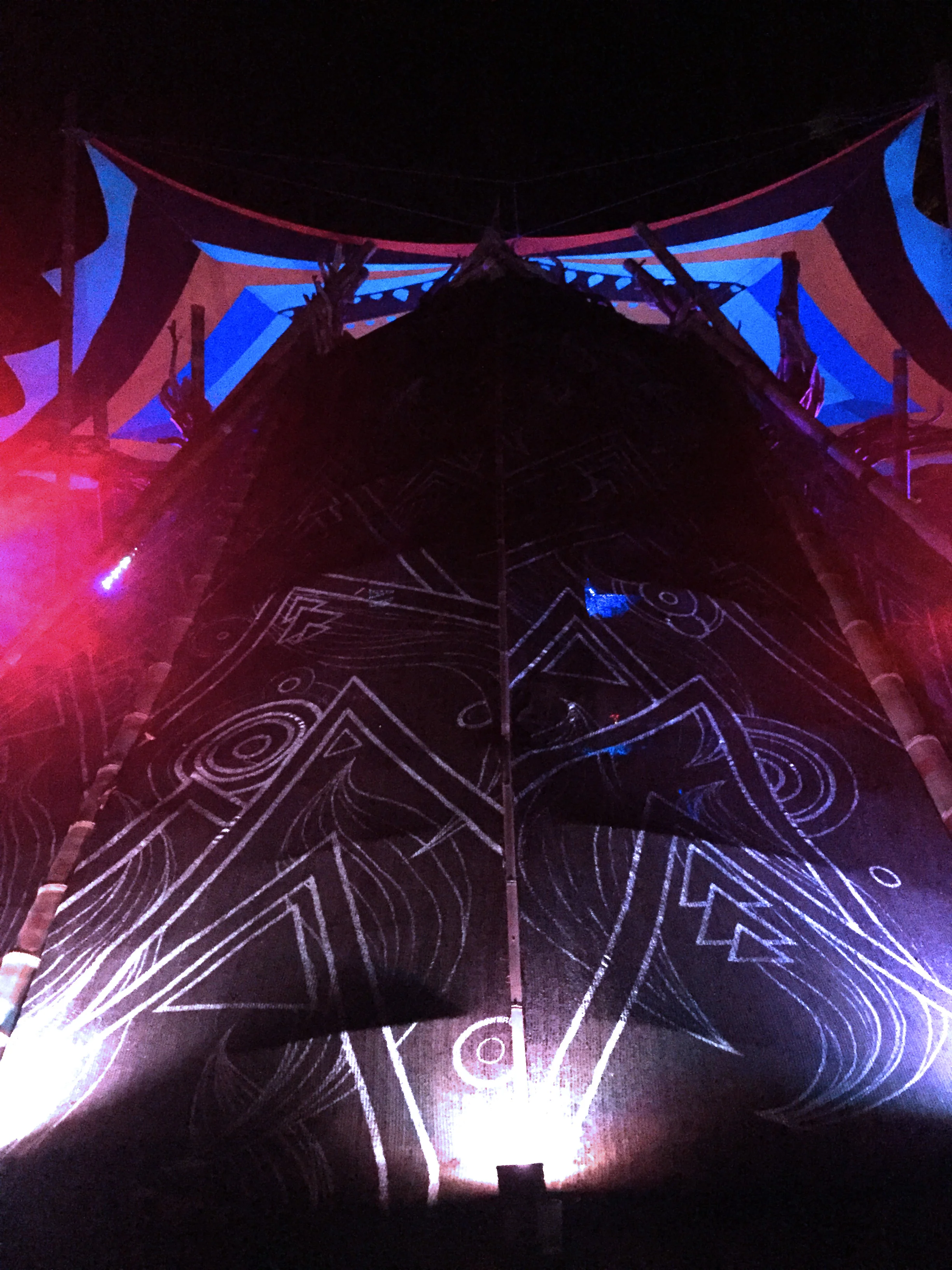 the spine of the stage, at night.