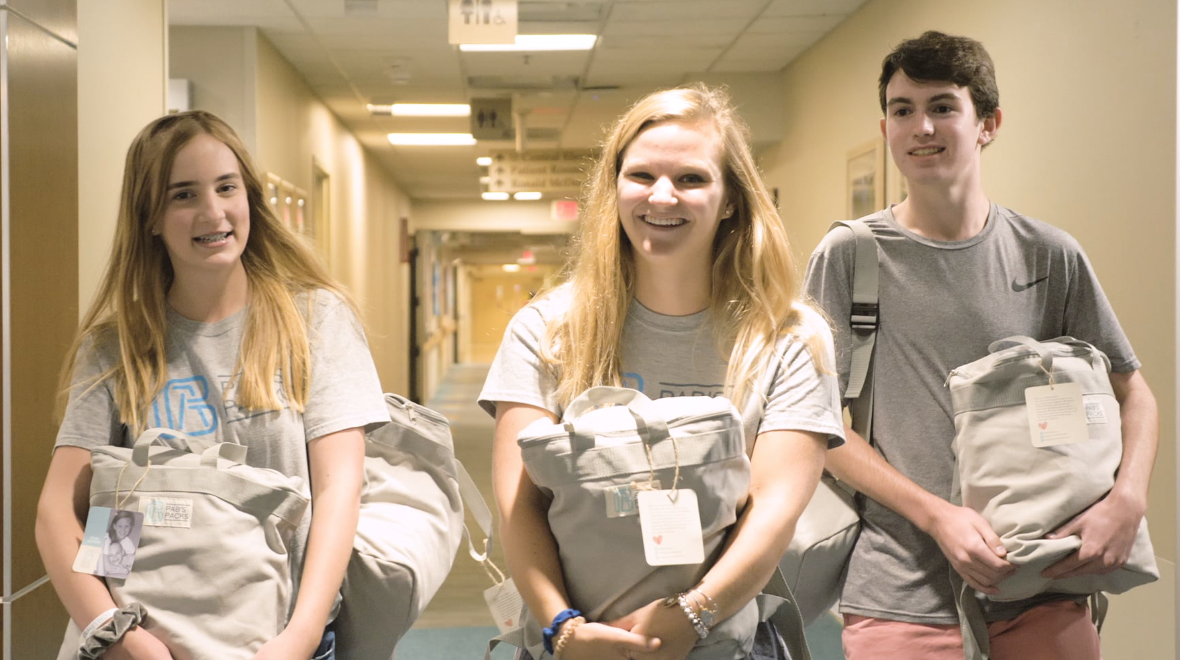 Abbie (center) with Teen Board members, Lauren and Brian, on a visit to Gillette Children’s in Saint Paul, MN.