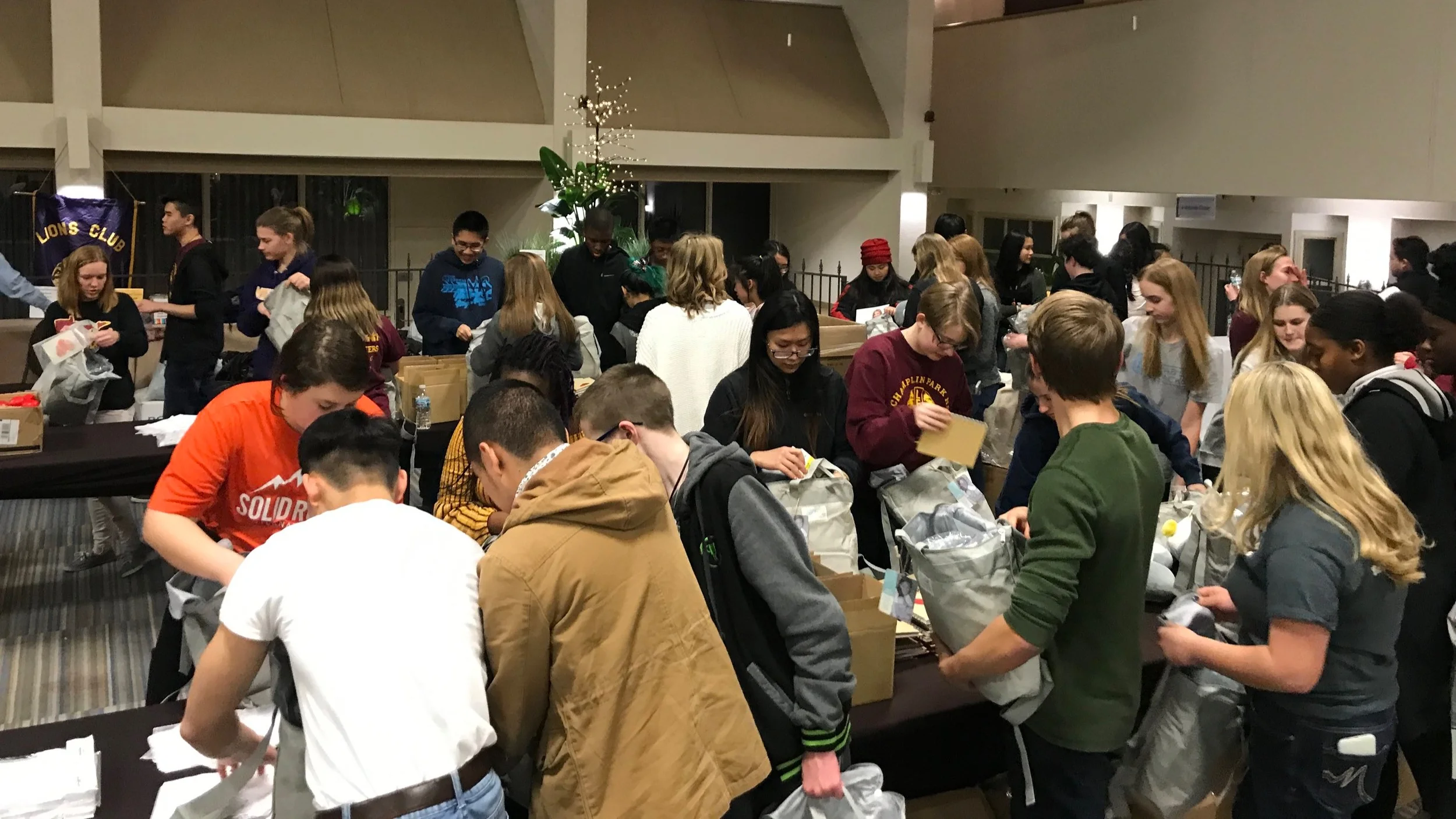 PAB’S PACKS partnered with 94 teen leaders from three local Leo Clubs in order to host a service learning event for at the annual Lions Club Convention in Bloomington, MN