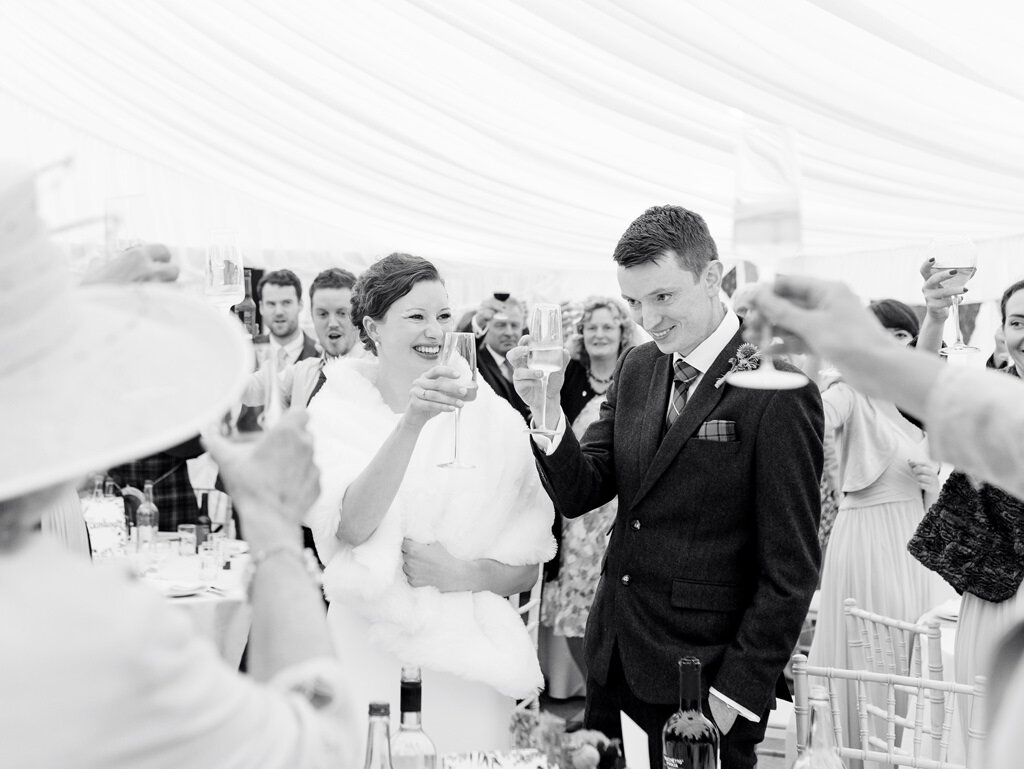 063-wedderlie-house-wedding-scotland-bride-and-groom-cheers.jpg